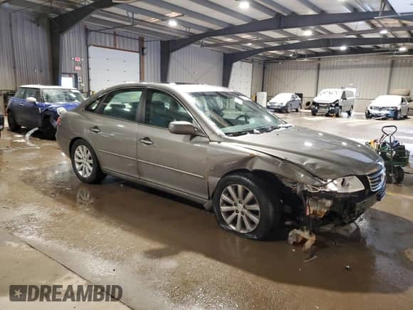 2009 Hyundai Azera GLS с VIN KMHFC46D59A371628, выставлен на аукционе Copart как лот 87460584 с пробегом 103 077 миль миль и Списание • Salvage title. История ставок и продаж доступна на DreamBid. Изображение 4.