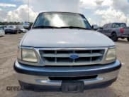 ✅ 1997 Ford F-150 XL • VIN: 1FTEX17L4VNB66944 • Lot: 62298315. Wystawiony na Copart z przebiegiem 172 314 mil. Bezpłatny archiwum sprzedaży aukcyjnych z USA i szczegółowy raport historii pojazdu na DreamBid. Zdjęcie 5.