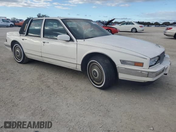✅ 1987 Cadillac Seville • VIN: 1G6KS518XHU812739 • Lot: 79308574. Listed on Copart with Not provided. Free auction sales archive from the USA and detailed vehicle history report at DreamBid. Image 4.