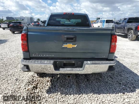 2014 Chevrolet Silverado 1500 LT z VIN 1GCRCREC4EZ290445, wystawiony jako Copart lot #87198435 z przebiegiem 166 498 mil mil oraz Szkoda całkowita • Salvage title. Historia ofert i sprzedaży dostępna na DreamBid. Obrazek 6.