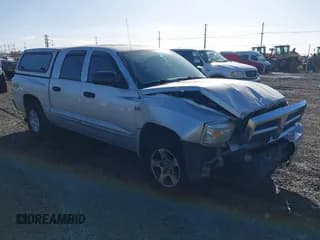 ✅ 2005 Dodge Dakota SLT • VIN: 1D7HW48N95S110474 • Lot: 43513144. Listed on IAAI with 209,765 mi. Free auction sales archive from the USA and detailed vehicle history report at DreamBid. Image 1.