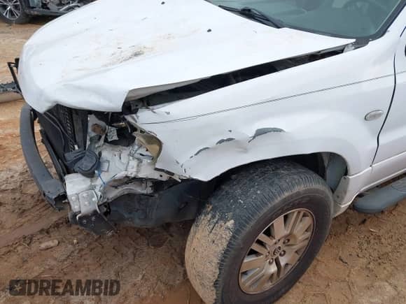 2005 Mercury Mariner Luxury z VIN 4M2YU56185DJ17484, wystawiony jako IAAI lot #42364348 z przebiegiem 199 262 mil mil oraz . Historia ofert i sprzedaży dostępna na DreamBid. Obrazek 13.