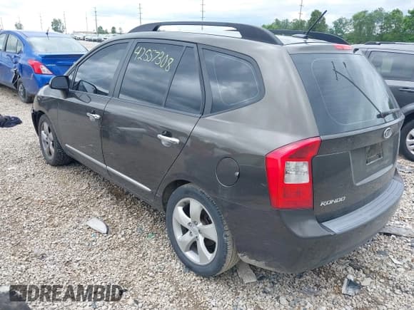 ✅ 2009 Kia Rondo LX • VIN: KNAFG529697276036 • Лот: 42557308. Опубликован ранее на IAAI с пробегом 144 775 миль. Бесплатный доступ к архиву аукционных продаж из США и подробный отчёт об истории автомобиля на DreamBid. Изображение 3.