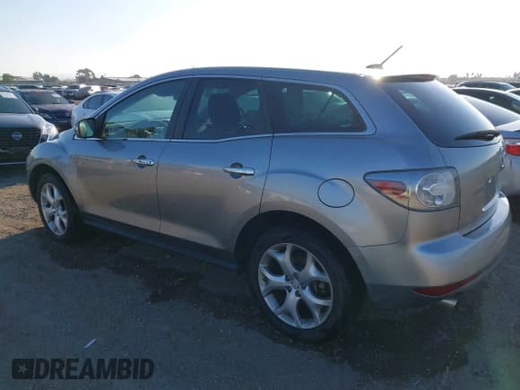 ✅ 2010 Mazda CX-7 Touring • VIN: JM3ER2WL8A0319874 • Lot: 43551067. Listed on IAAI with 108,600 mi. Free auction sales archive from the USA and detailed vehicle history report at DreamBid. Image 3.