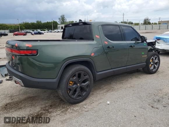 ✅ 2023 Rivian R1T Adventure • VIN: 7FCTGAAA8PN001040 • Lot: 71517874. Wystawiony na Copart z przebiegiem 19 789 mil. Bezpłatny archiwum sprzedaży aukcyjnych z USA i szczegółowy raport historii pojazdu na DreamBid. Zdjęcie 3.