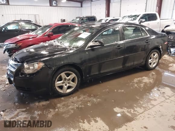 ✅ 2012 Chevrolet Malibu 1LS • VIN: 1G1ZB5E07CF179056 • Lot: 43664441. Listed on IAAI with 121,844 mi. Free auction sales archive from the USA and detailed vehicle history report at DreamBid. Image 2.