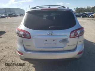✅ 2011 Hyundai Santa Fe SE • VIN: 5XYZH4AG3BG018315 • Lot: 76496954. Listed on Copart with 126,638 mi. Free auction sales archive from the USA and detailed vehicle history report at DreamBid. Image 6.