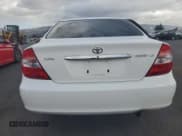 ✅ 2002 Toyota Camry XLE • VIN: JTDBE30K020102592 • Lot: 82474535. Wystawiony na Copart z przebiegiem 142 701 mil. Bezpłatny archiwum sprzedaży aukcyjnych z USA i szczegółowy raport historii pojazdu na DreamBid. Zdjęcie 6.