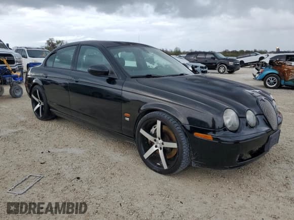 ✅ 2004 Jaguar S-Type R Supercharged • VIN: SAJEA03VX41N04180 • Lot: 79180744. Wystawiony na Copart z przebiegiem Nie podano. Bezpłatny archiwum sprzedaży aukcyjnych z USA i szczegółowy raport historii pojazdu na DreamBid. Zdjęcie 4.