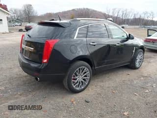 ✅ 2011 Cadillac SRX Premium Collection • VIN: 3GYFNCEY1BS673185 • Lot: 43700487. Wystawiony na IAAI z przebiegiem 208 111 mil. Bezpłatny archiwum sprzedaży aukcyjnych z USA i szczegółowy raport historii pojazdu na DreamBid. Zdjęcie 4.
