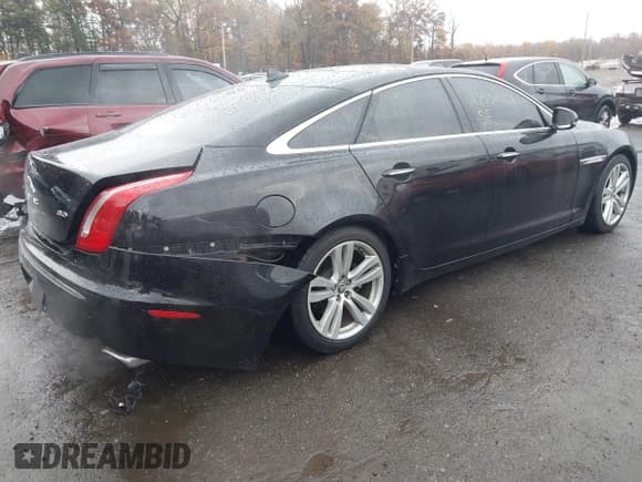 ✅ 2013 Jaguar XJ • VIN: SAJWA1C78D8V58290 • Lot: 43534028. Listed on IAAI with 79,199 mi. Free auction sales archive from the USA and detailed vehicle history report at DreamBid. Image 4.