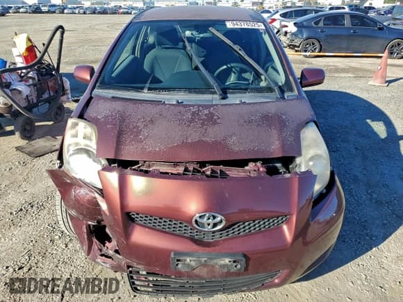 ✅ 2010 Toyota Yaris • VIN: JTDJT4K33A5291799 • Lot: 94378525. Listed on Copart with 126,873 mi. Free auction sales archive from the USA and detailed vehicle history report at DreamBid. Image 5.