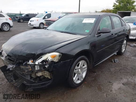 2014 Chevrolet Impala LT with VIN 2G1WB5E30E1121412, listed as a IAAI auction lot 43380958 with 116,443 mi miles and . Bid and sale history available at DreamBid. Image 2.
