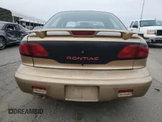 ✅ 1999 Pontiac Sunfire SE • VIN: 1G2JB5240X7567410 • Лот: 81315704. Опубликован ранее на Copart с пробегом 217 936 миль. Бесплатный доступ к архиву аукционных продаж из США и подробный отчёт об истории автомобиля на DreamBid. Изображение 6.