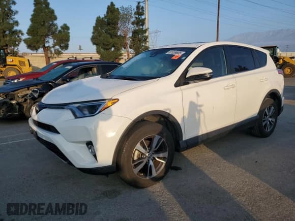 ✅ 2018 Toyota RAV4 XLE • VIN: JTMWFREV2JJ210306 • Лот: 82659905. Опубликован ранее на Copart с пробегом 23 770 миль. Бесплатный доступ к архиву аукционных продаж из США и подробный отчёт об истории автомобиля на DreamBid. Изображение 1.