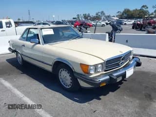 ✅ 1987 Mercedes-Benz 560 SL • VIN: WDBBA48D2HA061438 • Lot: 42419798. Wystawiony na IAAI z przebiegiem 123 332 mil. Bezpłatny archiwum sprzedaży aukcyjnych z USA i szczegółowy raport historii pojazdu na DreamBid. Zdjęcie 1.