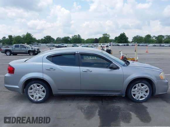 2013 Dodge Avenger SE with VIN 1C3CDZAB2DN540291, listed as a IAAI auction lot 42948168 with 148,169 mi miles and . Bid and sale history available at DreamBid. Image 13.