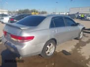 ✅ 2003 Honda Accord LX • VIN: 1HGCM66393A102094 • Lot: 41762701. Listed on IAAI with 171,002 mi. Free auction sales archive from the USA and detailed vehicle history report at DreamBid. Image 4.