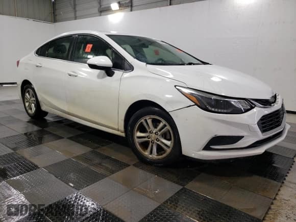 ✅ 2018 Chevrolet Cruze LT • VIN: 1G1BE5SM0J7115240 • Lot: 85850895. Listed on Copart with 143,645 mi. Free auction sales archive from the USA and detailed vehicle history report at DreamBid. Image 4.