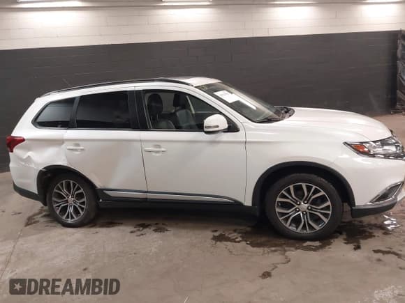 ✅ 2016 Mitsubishi Outlander SE • VIN: JA4AZ3A38GZ036751 • Lot: 42511953. Listed on IAAI with 110,266 mi. Free auction sales archive from the USA and detailed vehicle history report at DreamBid. Image 13.