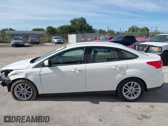 ✅ 2018 Ford Focus SE • VIN: 1FADP3F21JL225220 • Лот: 43670473. Опубликован ранее на IAAI с пробегом 125 394 миль. Бесплатный доступ к архиву аукционных продаж из США и подробный отчёт об истории автомобиля на DreamBid. Изображение 15.