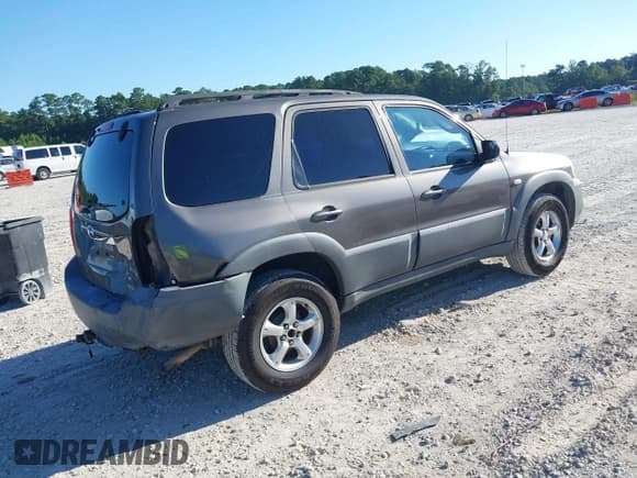 ✅ 2005 Mazda Tribute i • VIN: 4F2YZ02Z65KM48274 • Lot: 43129870. Listed on IAAI with 144,826 mi. Free auction sales archive from the USA and detailed vehicle history report at DreamBid. Image 4.