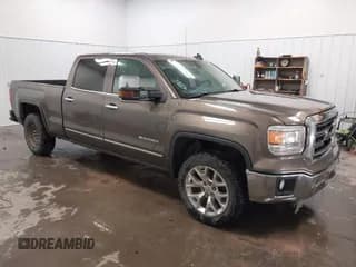 ✅ 2015 GMC Sierra 1500 SLT • VIN: 3GTU2VEJ4FG330917 • Lot: 43124965. Listed on IAAI with 206,071 mi. Free auction sales archive from the USA and detailed vehicle history report at DreamBid. Image 1.
