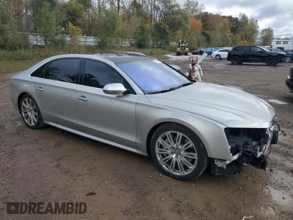✅ 2016 Audi A8 Sport • VIN: WAU43AFD2GN014467 • Лот: 87472755. Опубликован ранее на Copart с пробегом 101 368 миль. Бесплатный доступ к архиву аукционных продаж из США и подробный отчёт об истории автомобиля на DreamBid. Изображение 4.