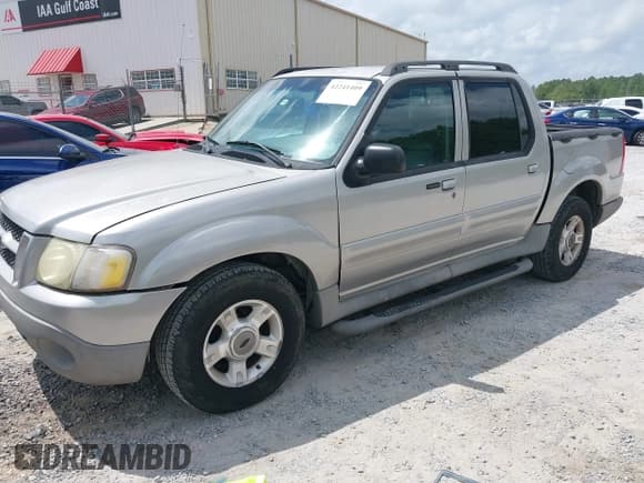 ✅ 2003 Ford Explorer Sport Trac XLS • VIN: 1FMZU77E23UA64779 • Lot: 42241409. Wystawiony na IAAI z przebiegiem 212 608 mil. Bezpłatny archiwum sprzedaży aukcyjnych z USA i szczegółowy raport historii pojazdu na DreamBid. Zdjęcie 2.