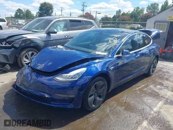 ✅ 2019 Tesla Model 3 Mid Range • VIN: 5YJ3E1EA5KF422825 • Lot: 43117261. Listed on IAAI with 68,977 mi. Free auction sales archive from the USA and detailed vehicle history report at DreamBid. Image 2.