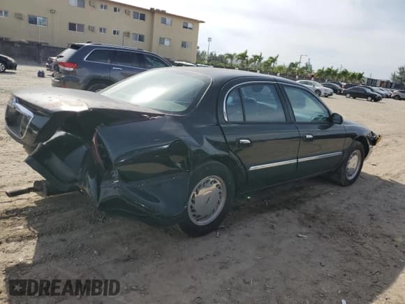 ✅ 1998 Lincoln Continental • VIN: 1LNFM97V8WY742639 • Lot: 82138303. Listed on Copart with 268,814 mi. Free auction sales archive from the USA and detailed vehicle history report at DreamBid. Image 3.