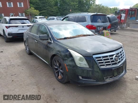 ✅ 2015 Cadillac XTS Livery • VIN: 2G61U5S32F9204216 • Лот: 42840047. Опубликован ранее на IAAI с пробегом 228 386 миль. Бесплатный доступ к архиву аукционных продаж из США и подробный отчёт об истории автомобиля на DreamBid. Изображение 1.