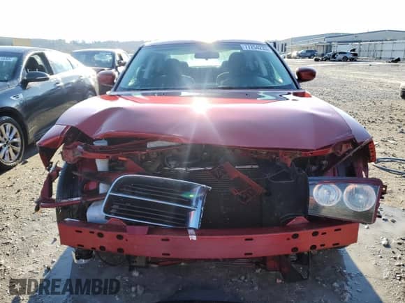 2010 Dodge Charger SXT with VIN 2B3CA3CV5AH178682, listed as a Copart auction lot 77254233 with 230,364 mi miles and Salvage title. Bid and sale history available at DreamBid. Image 5.