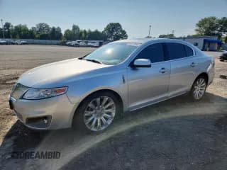 ✅ 2012 Lincoln MKS • VIN: 1LNHL9DR7CG807100 • Lot: 80471665. Listed on Copart with 118,009 mi. Free auction sales archive from the USA and detailed vehicle history report at DreamBid. Image 1.