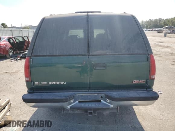 ✅ 1998 GMC Suburban • VIN: 3GKFK16R1WG511256 • Lot: 77568484. Listed on Copart with 301,116 mi. Free auction sales archive from the USA and detailed vehicle history report at DreamBid. Image 6.