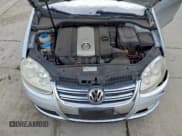 ✅ 2009 Volkswagen Jetta S • VIN: 3VWJZ71K99M156757 • Lot: 95053545. Listed on Copart with 111,870 mi. Free auction sales archive from the USA and detailed vehicle history report at DreamBid. Image 11.