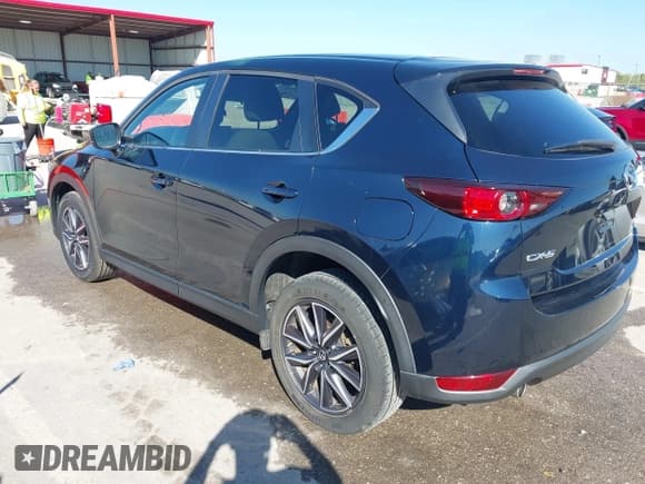 ✅ 2018 Mazda CX-5 Touring • VIN: JM3KFACM5J1473522 • Lot: 43315278. Listed on IAAI with 56,327 mi. Free auction sales archive from the USA and detailed vehicle history report at DreamBid. Image 3.