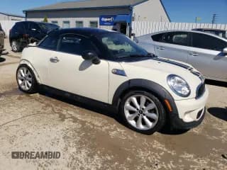 ✅ 2014 MINI Coupe S • VIN: WMWSX3C54ET772839 • Lot: 73992794. Listed on Copart with 100,580 mi. Free auction sales archive from the USA and detailed vehicle history report at DreamBid. Image 4.