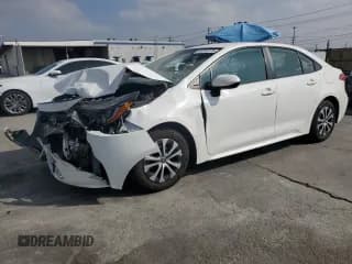 ✅ 2022 Toyota Corolla Hybrid LE • VIN: JTDEAMDE3NJ036637 • Lot: 91701075. Wystawiony na Copart z przebiegiem 67 371 mil. Bezpłatny archiwum sprzedaży aukcyjnych z USA i szczegółowy raport historii pojazdu na DreamBid. Zdjęcie 1.