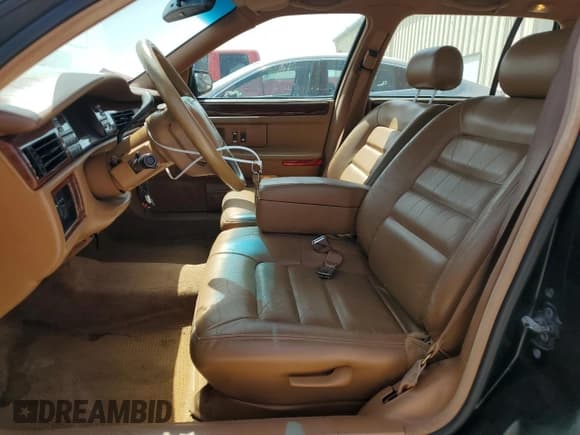 ✅ 1994 Cadillac DeVille • VIN: 1G6KD52B7RU265791 • Lot: 65560084. Listed on Copart with 123,834 mi. Free auction sales archive from the USA and detailed vehicle history report at DreamBid. Image 7.