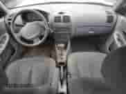 2002 Hyundai Accent GL z VIN KMHCG45C02U319604, wystawiony jako Copart lot #47602165 z przebiegiem 177 913 mil mil oraz Czysty tytuł • Clean title. Historia ofert i sprzedaży dostępna na DreamBid. Obrazek 8.