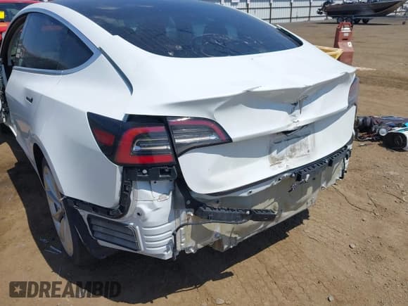 ✅ 2018 Tesla Model 3 Long Range Battery • VIN: 5YJ3E1EAXJF053717 • Lot: 42615984. Listed on IAAI with 79,735 mi. Free auction sales archive from the USA and detailed vehicle history report at DreamBid. Image 6.