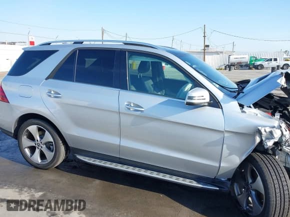 ✅ 2019 Mercedes-Benz GLE 400 • VIN: 4JGDA5GB9KB213261 • Lot: 41947362. Listed on IAAI with 60,068 mi. Free auction sales archive from the USA and detailed vehicle history report at DreamBid. Image 13.