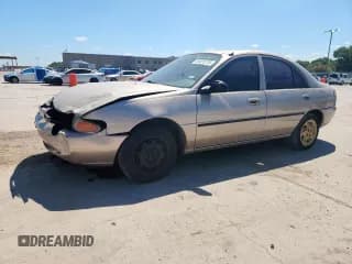 ✅ 1999 Ford Escort LX • VIN: 1FAFP10PXXW244941 • Lot: 66805705. Listed on Copart with 1,344,002 mi. Free auction sales archive from the USA and detailed vehicle history report at DreamBid. Image 1.