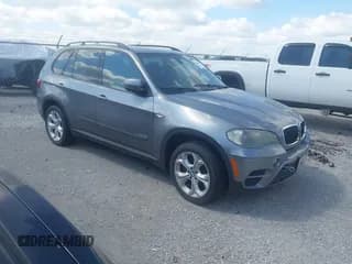 ✅ 2011 BMW X5 35i • VIN: 5UXZV4C53BL416387 • Lot: 43053412. Listed on IAAI with 153,752 mi. Free auction sales archive from the USA and detailed vehicle history report at DreamBid. Image 1.