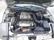 ✅ 2001 Mitsubishi Eclipse GT • VIN: 4A3AE55H81E007247 • Lot: 42503116. Wystawiony na IAAI z przebiegiem 137 217 mil. Bezpłatny archiwum sprzedaży aukcyjnych z USA i szczegółowy raport historii pojazdu na DreamBid. Zdjęcie 10.