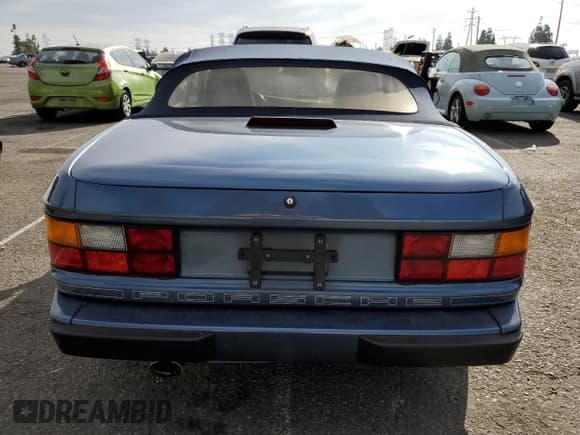 ✅ 1990 Porsche 944 • VIN: WP0CB2944LN480348 • Лот: 41428305. Опубликован ранее на Copart с пробегом 85 927 миль. Бесплатный доступ к архиву аукционных продаж из США и подробный отчёт об истории автомобиля на DreamBid. Изображение 6.