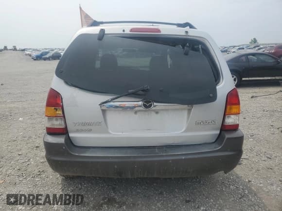 ✅ 2003 Mazda Tribute ES • VIN: 4F2CZ06123KM13033 • Лот: 60895565. Опубликован ранее на Copart с пробегом 219 939 миль. Бесплатный доступ к архиву аукционных продаж из США и подробный отчёт об истории автомобиля на DreamBid. Изображение 6.