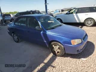 2002 Hyundai Accent GL with VIN KMHCG45C32U332833, listed as a Copart auction lot 66539644 with 69,763 mi miles and Salvage title. Bid and sale history available at DreamBid. Image 4.