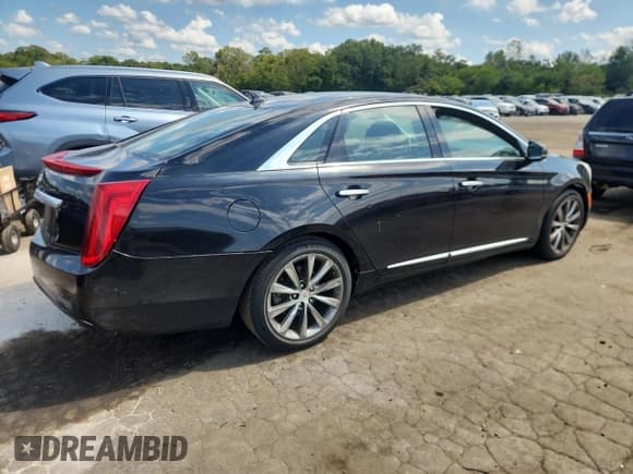 ✅ 2014 Cadillac XTS Livery • VIN: 2G61U5S36E9275479 • Лот: 68787685. Опубликован ранее на Copart с пробегом 223 320 миль. Бесплатный доступ к архиву аукционных продаж из США и подробный отчёт об истории автомобиля на DreamBid. Изображение 3.